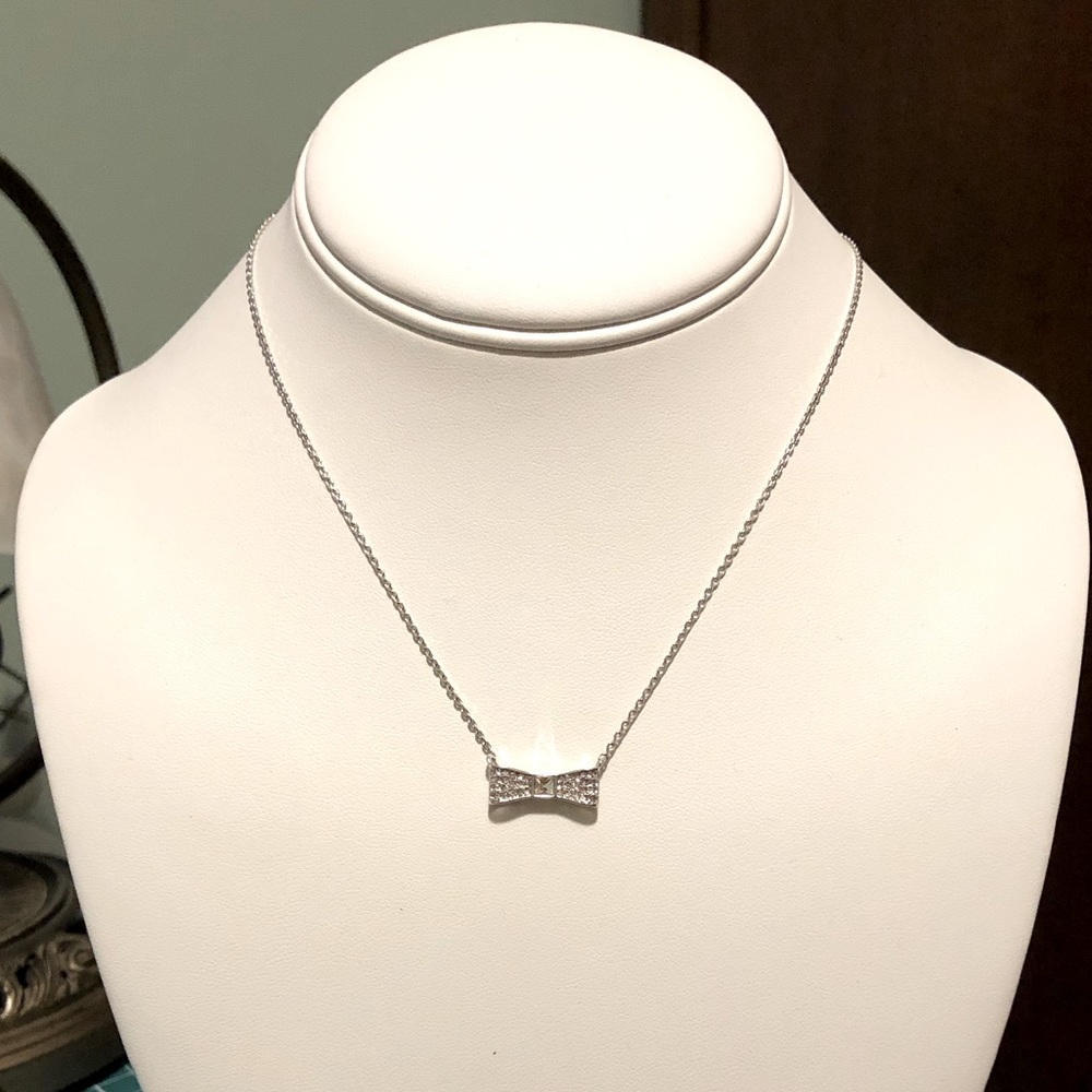 Kate Spade Rhinestone Silver tone Bow necklace